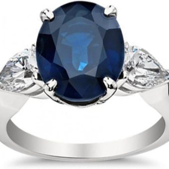 9.33 ct Oval Shape Sapphire with Pear Shape Diamond Anniversary Ring in 18 kt White Gold